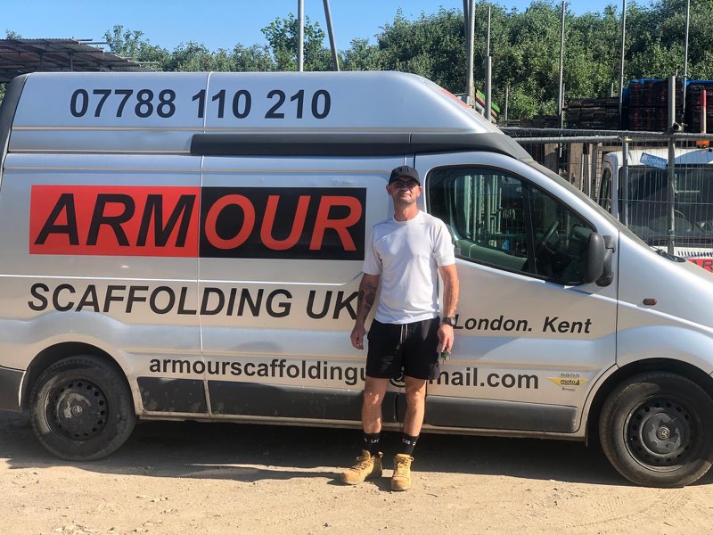 Ray from Armour Scaffolding UK in front of the company van